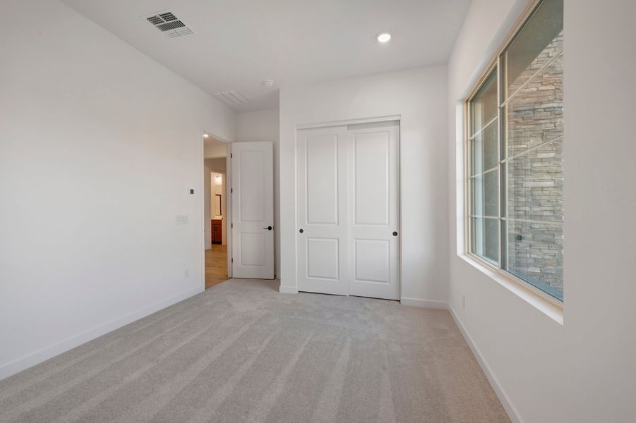 Spacious, unfurnished interior of a new home in Blossom Rock, Apache Junction (Image 32). Spacious, unfurnished interior of a new home in Blossom Rock, Apache Junction (Image 32).