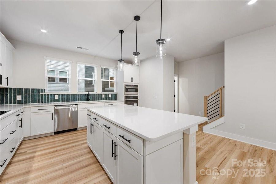 Included GE Stainless Appliances.