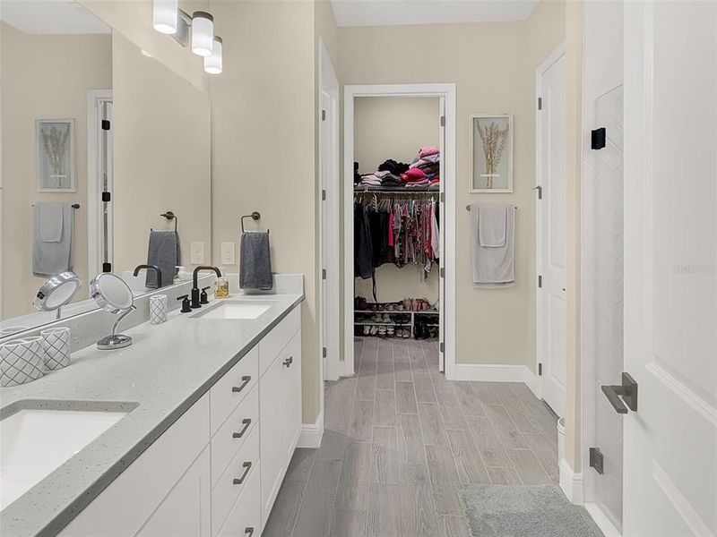 Primary Bathroom with Walk-In Closet