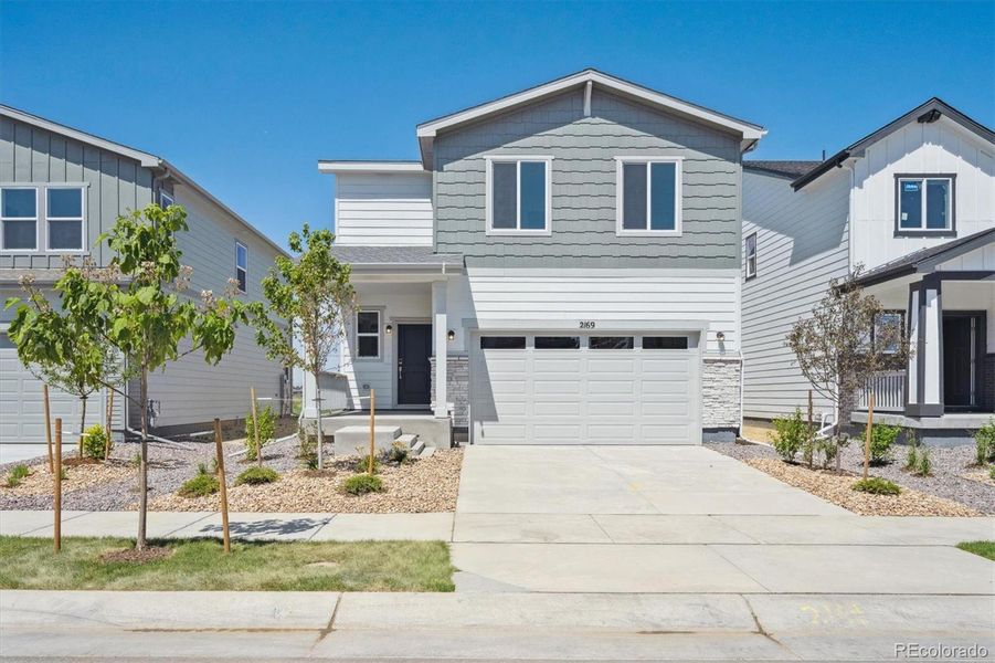 Front exterior of a new home in Farmlore, Brighton, CO, highlighting curb appeal (Image 1). Front exterior of a new home in Farmlore, Brighton, CO, highlighting curb appeal (Image 1).