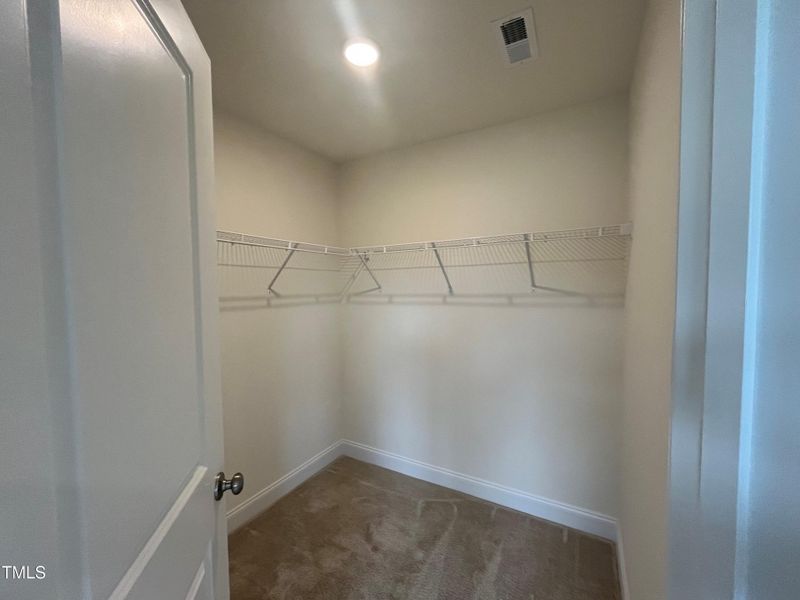 Primary walk in closet 16