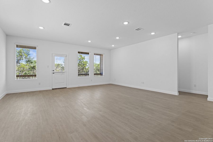 Spacious, unfurnished interior of a new home in Waterwheel: Coastline Collection, San Antonio (Image 19).