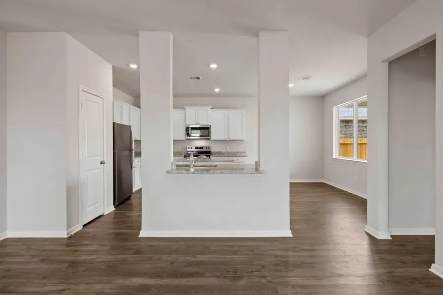 Spacious, unfurnished interior of a new home in Vacek Country Meadows, Richmond (Image 11).