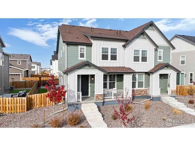 Front exterior of a new home in , Commerce City, CO, highlighting curb appeal (Image 23).