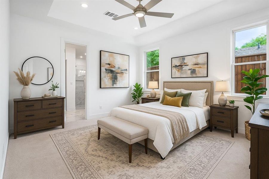 Bedroom featuring recessed lighting, light carpet, connected bathroom, ceiling fan, and a raised ceiling