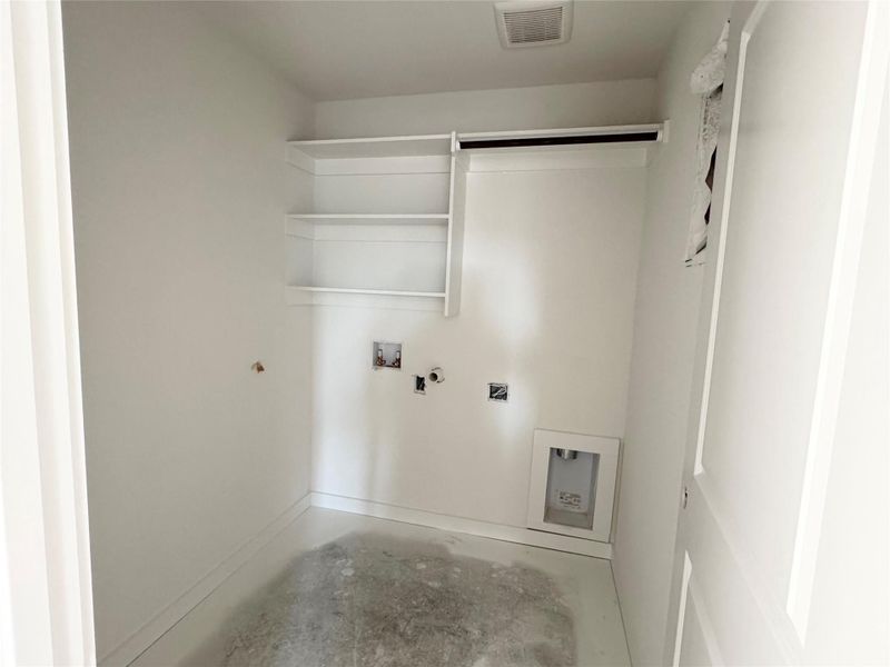 Laundry room with unfinished concrete flooring, hookup for a washing machine, gas dryer hookup, and electric dryer hookup