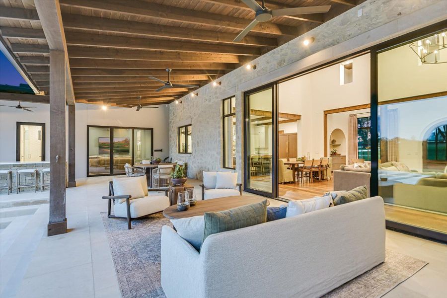 View of patio with outdoor dining area, a ceiling fan, and an outdoor hangout area View of patio with outdoor dining area, a ceiling fan, and an outdoor hangout area