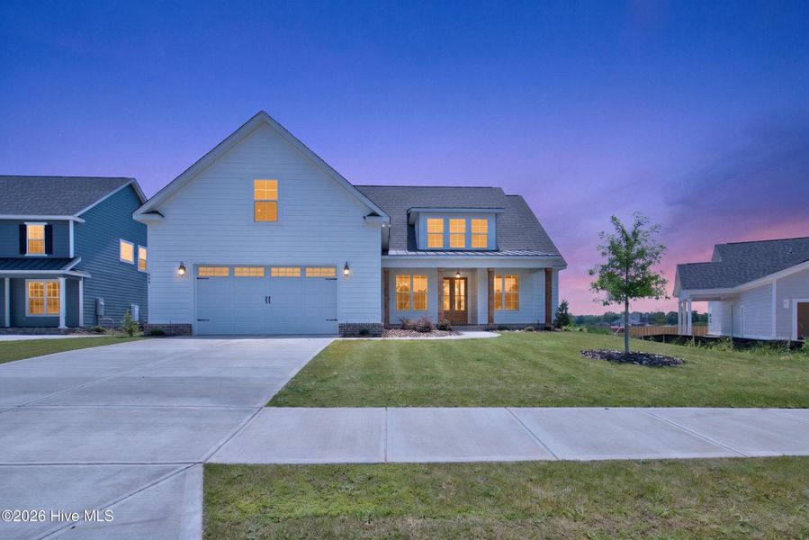 Front exterior of a new home in Highland Lakes, Evans, GA, highlighting curb appeal (Image 26).