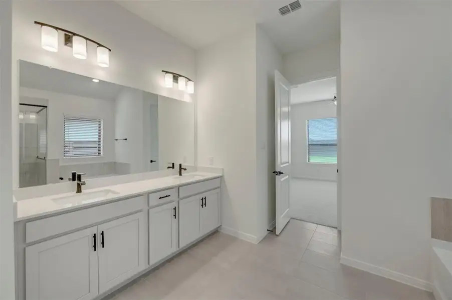 Furnished interior view inside a new home in Austin Point - Terrace Collection, Richmond (Image 5).