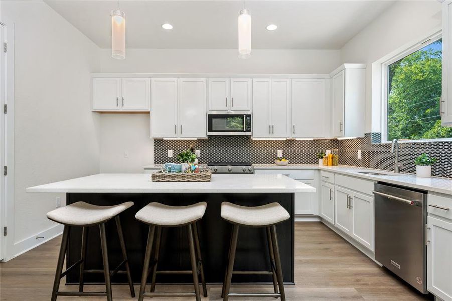 Bright and airy kitchen flooded with natural light, perfect for culinary creativity.