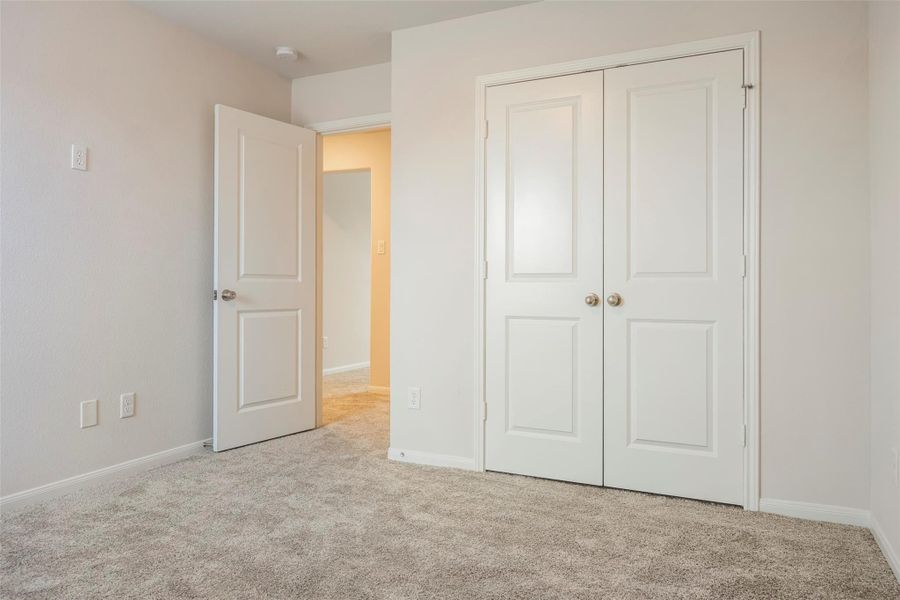 Spacious, unfurnished interior of a new home in Sunterra, Katy (Image 24).