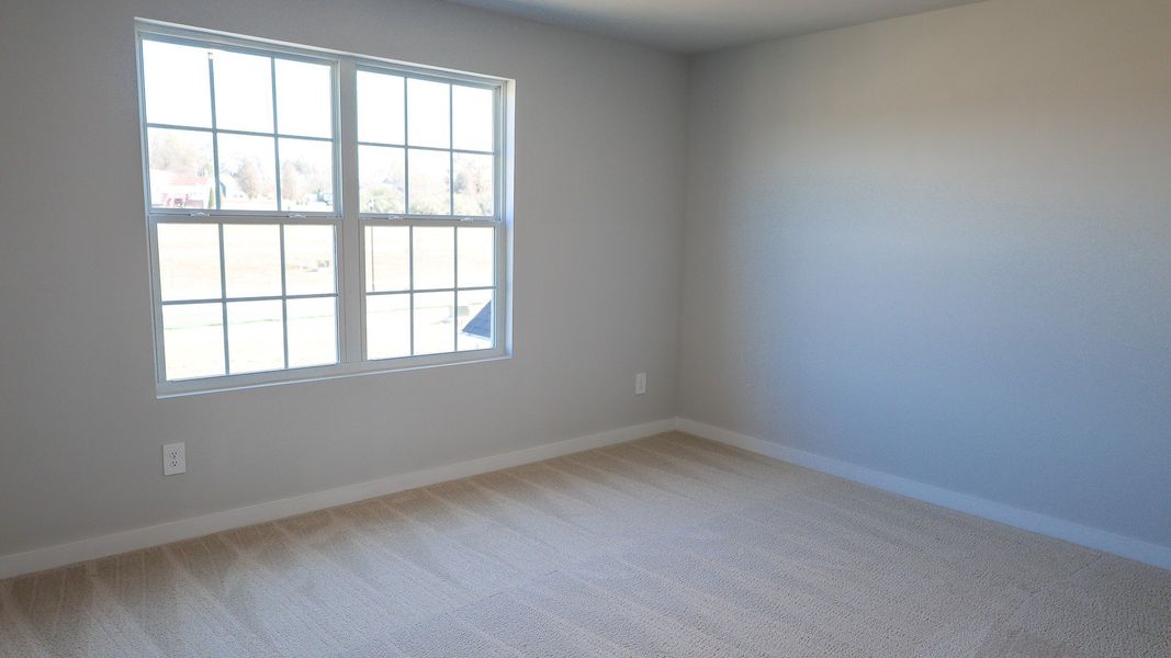 Representative unfurnished interior of a home built from the STONEBROOK II by D.R. Horton in Harvest Point, Spring Hill (Image 57).