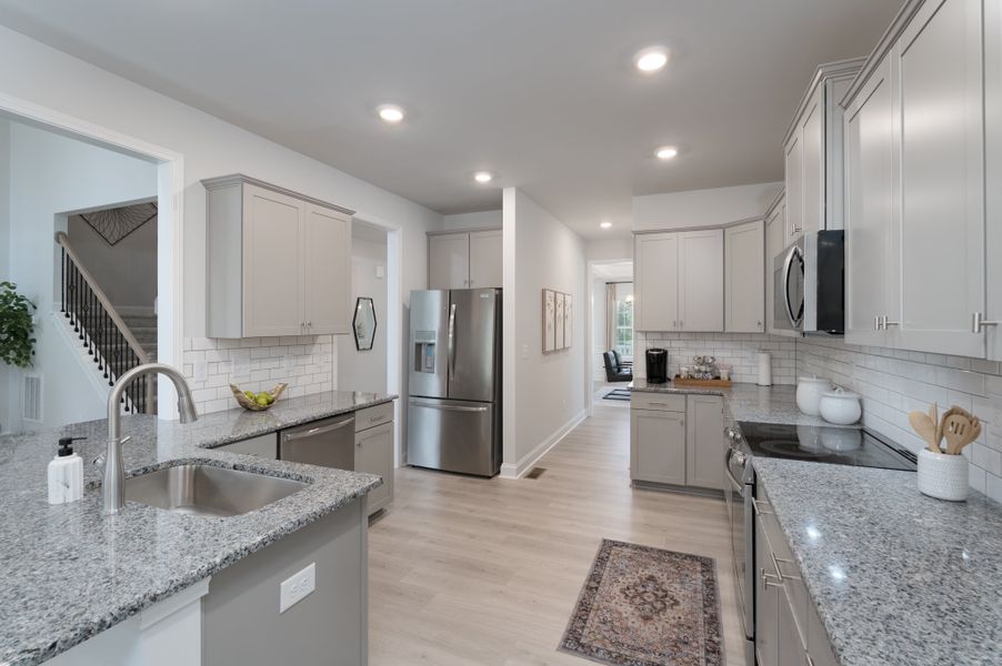 Representative furnished interior of a home built from the 3320 by Adams Homes in Norris Landing, Snellville (Image 15).
