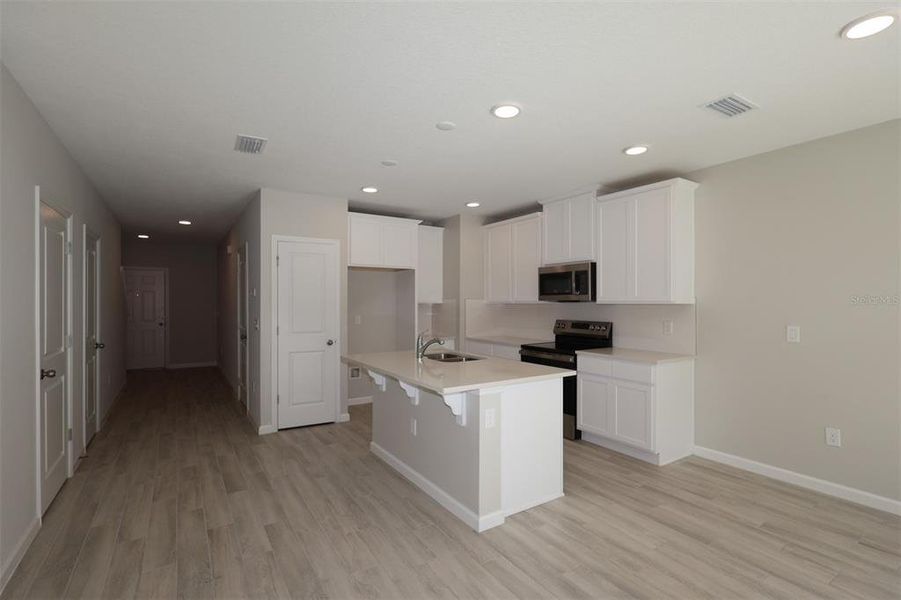 Furnished interior view inside a new home in Tyson Ranch, Orlando (Image 7).