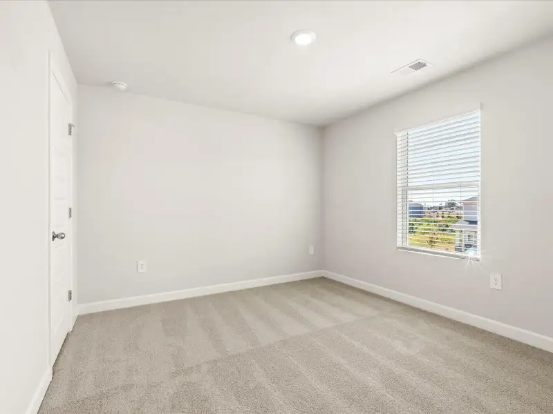 Spacious, unfurnished interior of a new home in Brayfield Manor - Heritage Collection, Wellford (Image 24).