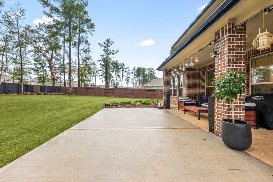 Exterior details and patio area of a home in ARTAVIA: Fairway Collection, Conroe (Image 4).