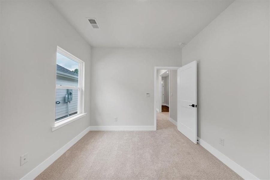 Spacious, unfurnished interior of a new home in Canterbury Villas, Carrollton (Image 27).