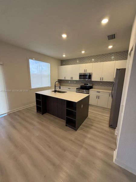 Furnished interior view inside a new home in , Homestead (Image 6).
