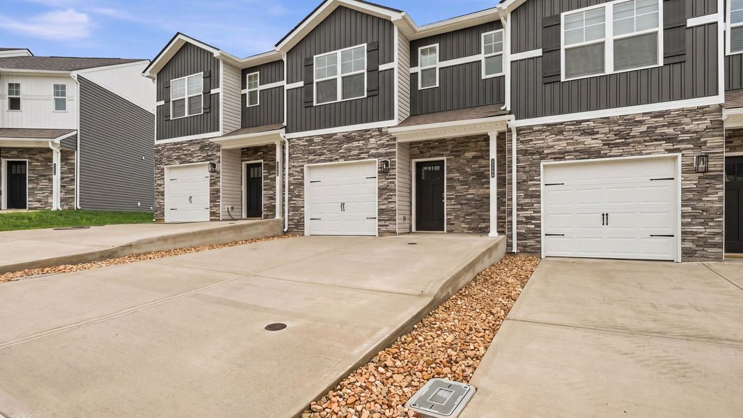 Front exterior of a new home in The Arbor Townhomes, Kingsport, TN, highlighting curb appeal (Image 17).