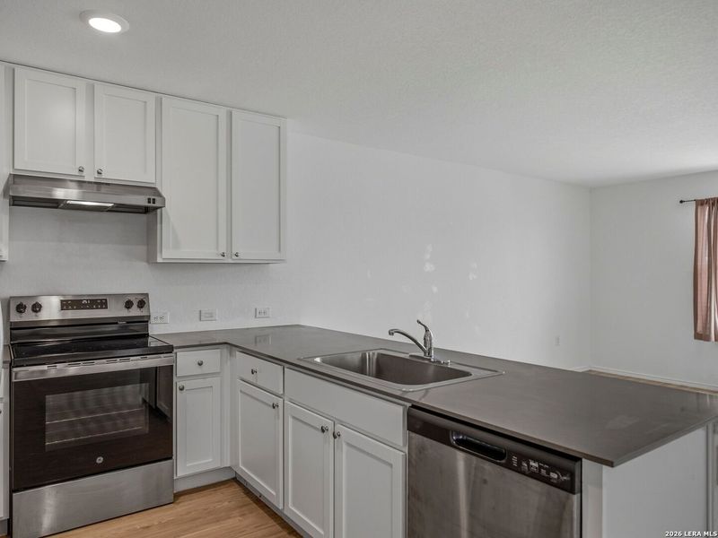 Furnished interior view inside a new home in Mission del Lago, San Antonio (Image 4).