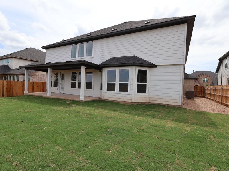 Exterior details and patio area of a home in Edgewood, Leander (Image 19). Exterior details and patio area of a home in Edgewood, Leander (Image 19).