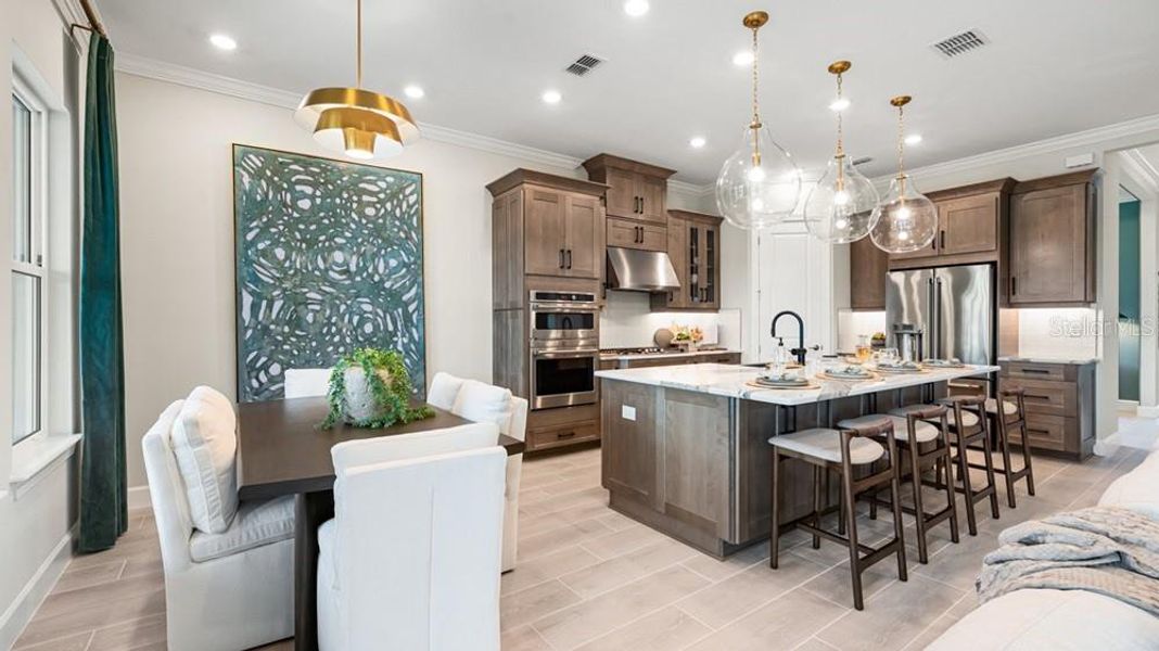 Furnished interior view inside a new home in Esplanade at Wellen Park, Englewood (Image 10).