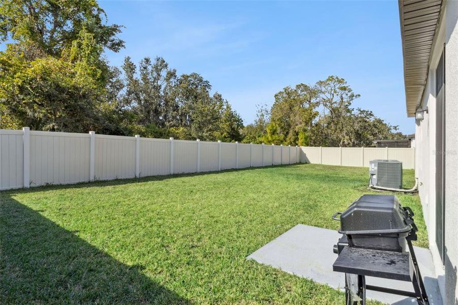 Exterior details and patio area of a home in Salt Meadows - Premier Series, Parrish (Image 3).