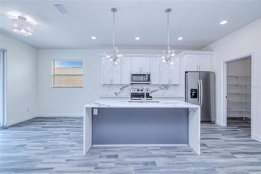 Furnished interior view inside a new home in , Port Charlotte (Image 15). Furnished interior view inside a new home in , Port Charlotte (Image 15).