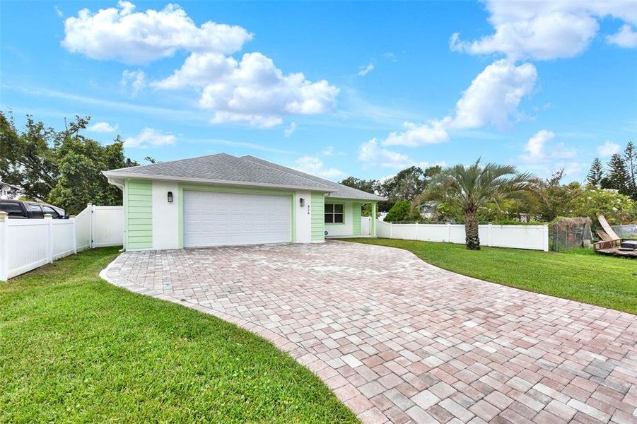 Front exterior of a new home in , Orlando, FL, highlighting curb appeal (Image 17).