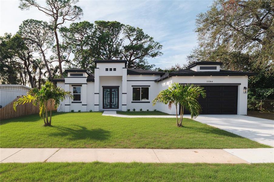 Front exterior of a new home in , Clearwater, FL, highlighting curb appeal (Image 1). Front exterior of a new home in , Clearwater, FL, highlighting curb appeal (Image 1).