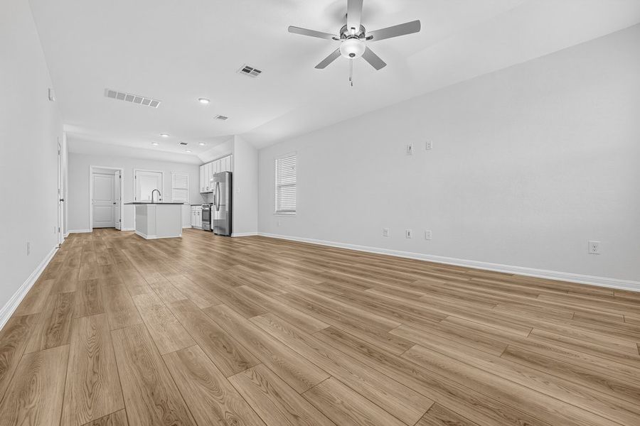Representative unfurnished interior of a home built from the Capercaillie by Taylor Morrison in Emory Crossing, Hutto (Image 9).