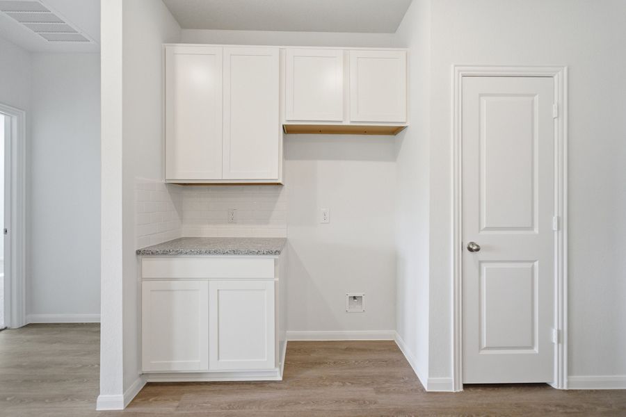 Furnished interior view inside a new home in The Pines at Seven Coves, Willis (Image 8).