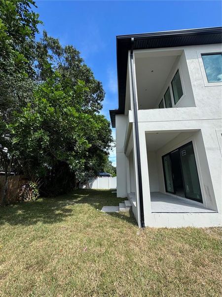 Front exterior of a new home in , Tampa, FL, highlighting curb appeal (Image 22).