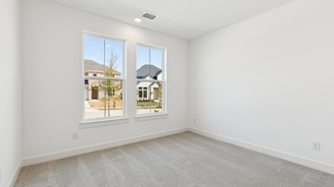 Representative unfurnished interior of a home built from the Tristan by Normandy Homes in Rainwater Crossing, Celina (Image 17).