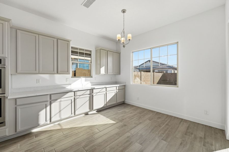 Furnished interior view inside a new home in Ellsworth Ranch, Queen Creek (Image 14).
