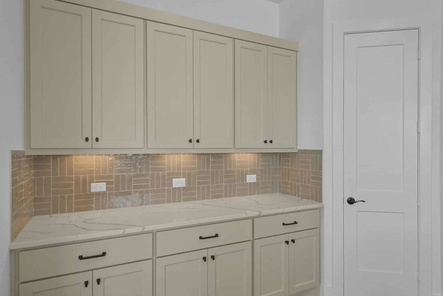 Representative furnished interior of a home built from the Nicklaus by Chesmar Homes in Riceland Alley Loads, Mont Belvieu (Image 7).