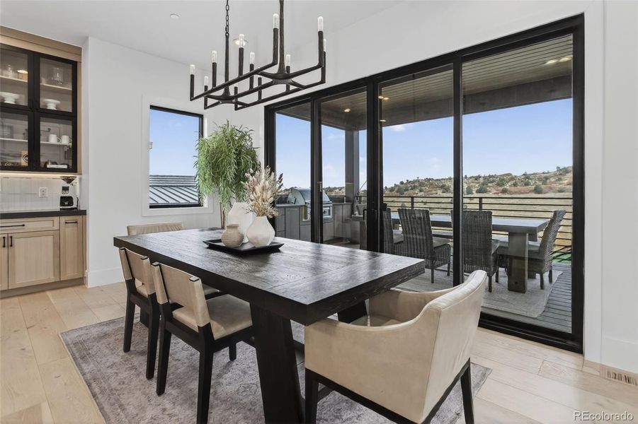 Dining Room opening to sprawling back deck Dining Room opening to sprawling back deck