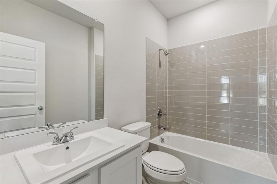 Bathroom in the Winters home plan by Trophy Signature Homes – REPRESENTATIVE PHOTO Bathroom in the Winters home plan by Trophy Signature Homes – REPRESENTATIVE PHOTO