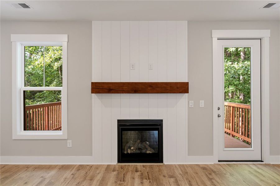 A striking fireplace with a substantial timber man