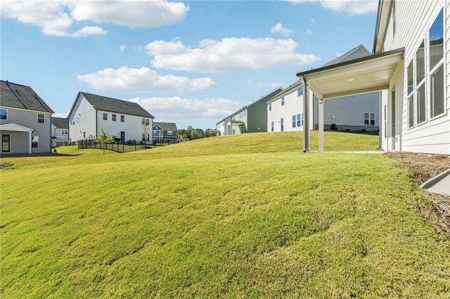 Exterior details and patio area of a home in East Harbor II at Chestatee, Dawsonville (Image 21).