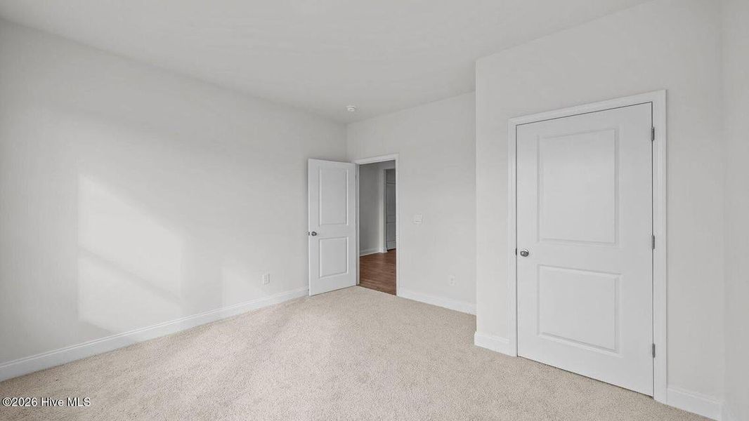 Spacious, unfurnished interior of a new home in Villa Grande, Winterville (Image 13).