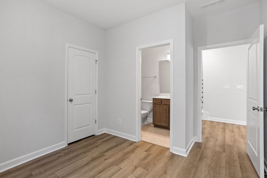 Spacious, unfurnished interior of a new home in Sweetbrier, Durham (Image 18).