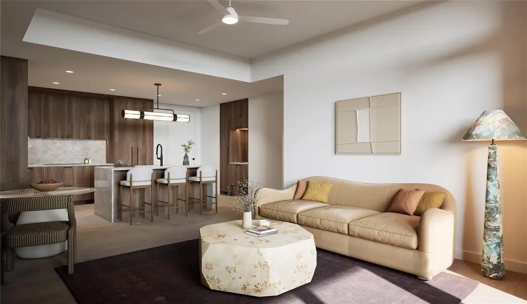 Bright living room with wood floors, floor-to-ceiling windows, ceiling fan, and skyline view.