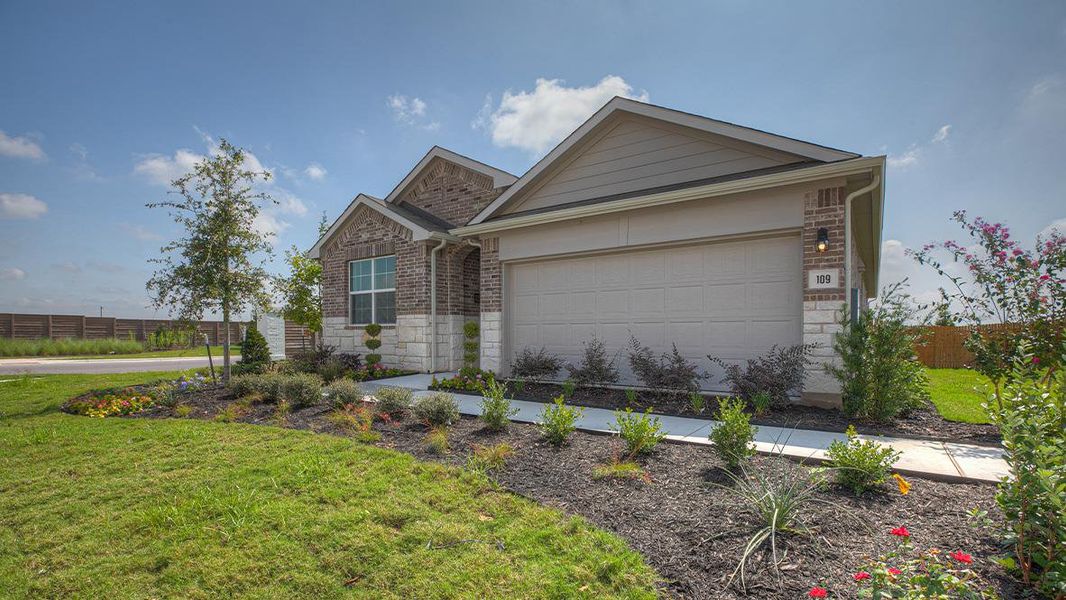 Front exterior of a new home in Southgrove, Kyle, TX, highlighting curb appeal (Image 20). Front exterior of a new home in Southgrove, Kyle, TX, highlighting curb appeal (Image 20).