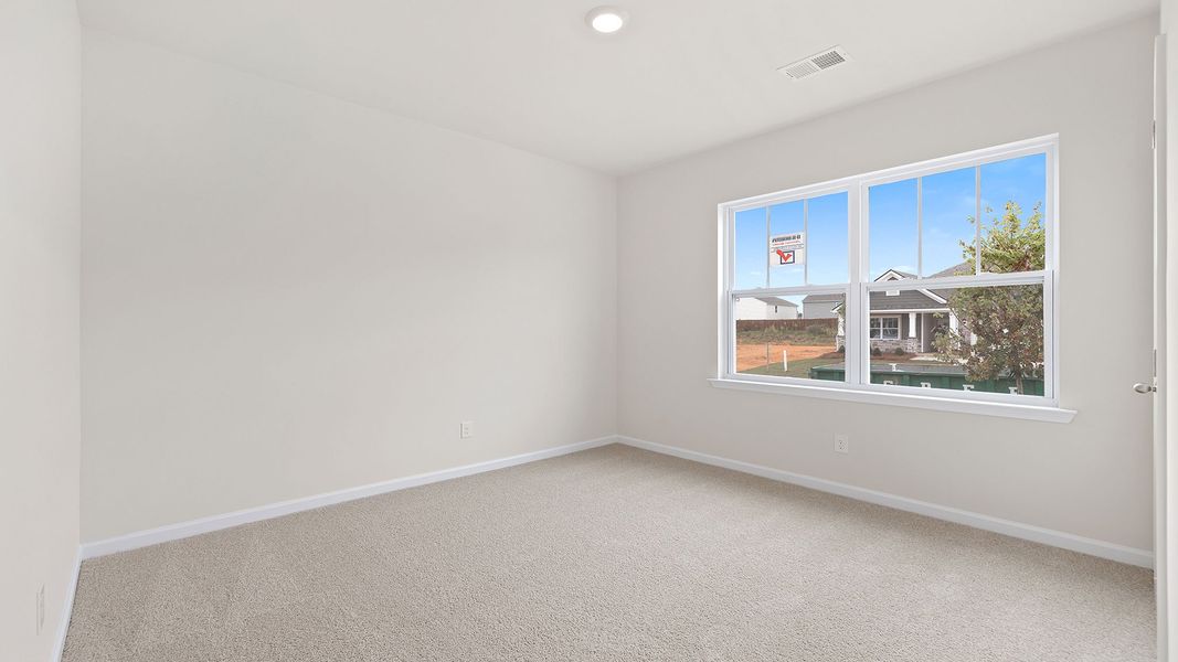 Spacious, unfurnished interior of a new home in Durbin Meadows Traditions, Fountain Inn (Image 14).