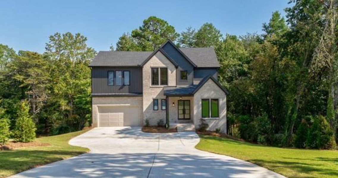 Front exterior of a new home in , Cumming, GA, highlighting curb appeal (Image 27). Front exterior of a new home in , Cumming, GA, highlighting curb appeal (Image 27).