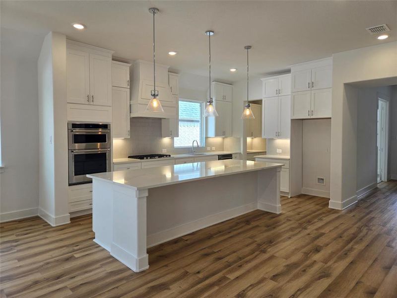 Your spacious kitchen island is the perfect place for friends and family to gather!