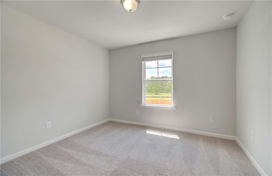 Spacious, unfurnished interior of a new home in Enclave at Evergreen, Fairburn (Image 23).