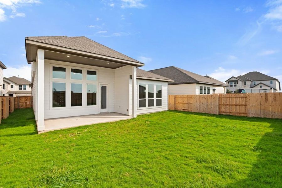 Front exterior of a new home in Arbor Collection At Park Central, Georgetown, TX, highlighting curb appeal (Image 19). Front exterior of a new home in Arbor Collection At Park Central, Georgetown, TX, highlighting curb appeal (Image 19).
