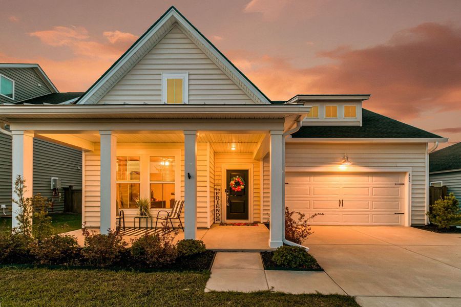 Front exterior of a new home in Heron's Walk at Summers Corner, Summerville, SC, highlighting curb appeal (Image 23).